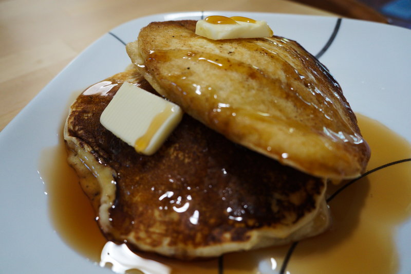 Pancakes drizzled in syrup